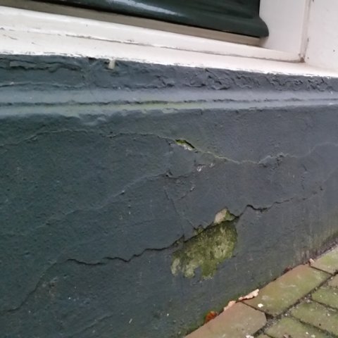 schade plint stucwerk afsluitende verf